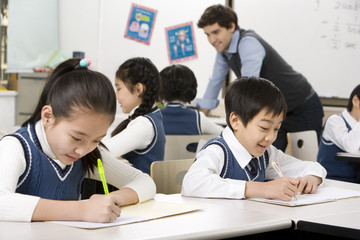 Students writing in class