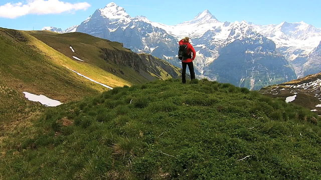 aerial drone female hiker Switzerland outdoor fitness tourism vacation travel 