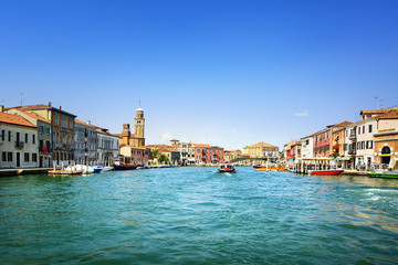 Fototapeta na wymiar Murano glass making island, water canal and buildings. Venice, I