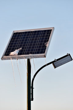 Icicles on a solar street lamp