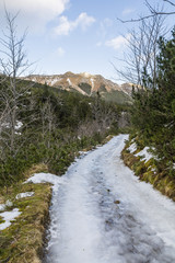 Fototapeta na wymiar An icy road in the mountains.
