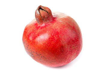 Ripe pomegranate fruit isolated on white background