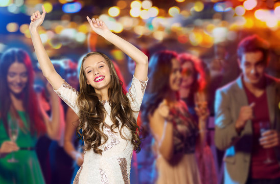 Happy Young Woman Or Teen Dancing At Disco Club