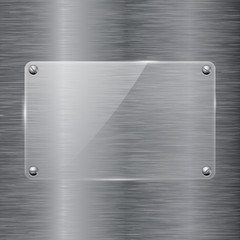 Glass plate on brushed metal background. Transparent frame with screw head. 