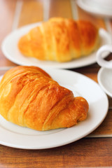 Croissant bread on dish