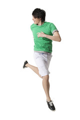 Young man jumping in mid-air