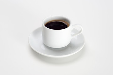 Cup of coffee over white background