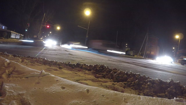 GoPro perspective moving cars in the night street time lapse.