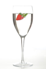 Strawberry  in a tall glass of water