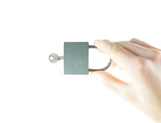 Lock and key in the hands of