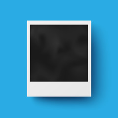 Realistic photo frame with shadow on blue background