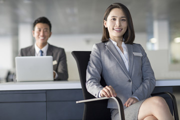 Business person sitting in office
