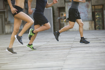 Fototapeta na wymiar Young joggers running outdoors