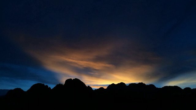 Time lapse Beautiful sunset behind the mountains at Vang Vieng,Lao. time-lapse Video HD Format.