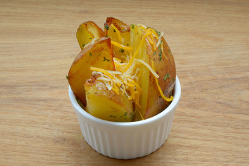 Homemade fried potato with spices and herbs