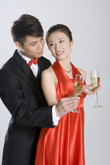 Young couple in evening wear