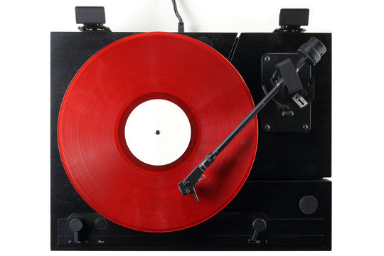 vintage turntable with red vinyl record isolated on white