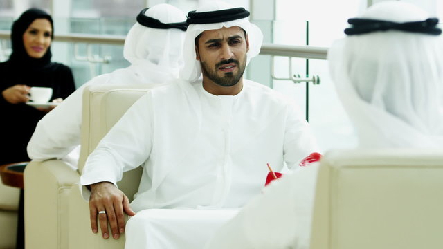 business male female teamwork national dress Dubai financial real estate wealth
