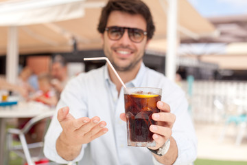 Young man drinking a beverage