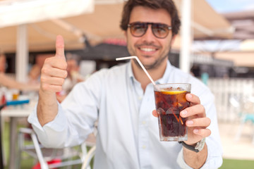 Young man drinking a beverage