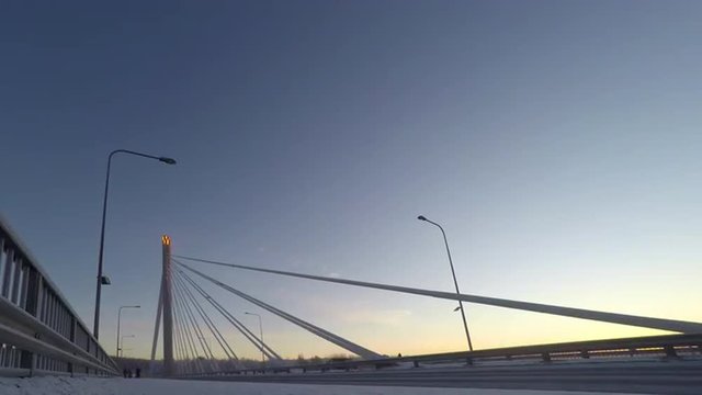 Beautiful vibrant scandinavian winter scene: Bridge over Kemijoki river, Time-lapse 