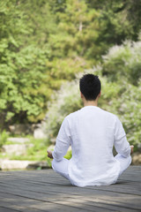 Young man practicing yoga