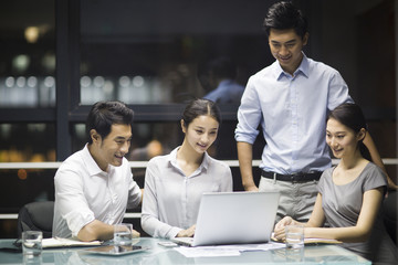 Young business people talking in meeting