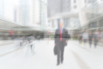 motion blur businessman walking to work