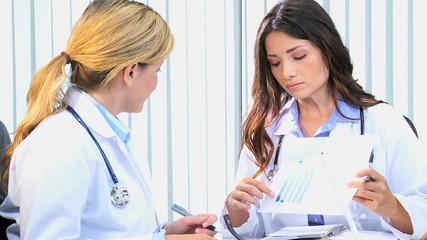 Western Caucasian female hospital doctor medical healthcare patient results data - Powered by Adobe