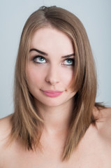 Fototapeta premium Perfect skin and arrogant female model looking up