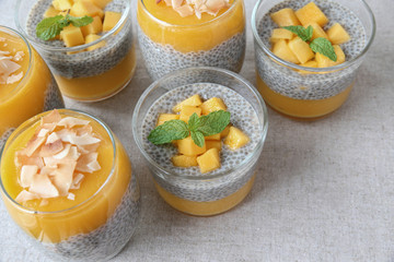 Homemade Chia seed pudding with mango, selective focus, toning