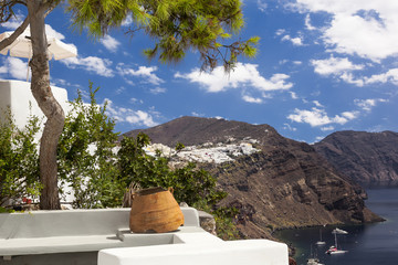 Old broken vase with a tree in Santorini