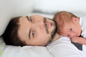 Newborn with his father