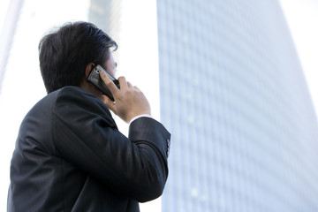 Businessman using cellphone