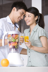 Couple drinking fresh fruit juice