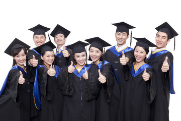 Portrait of graduates showing thumbs up