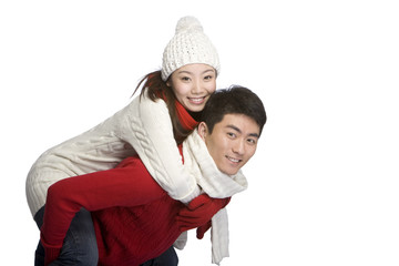 Young couple in winter clothes