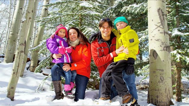 portrait snow outdoor lifestyle Caucasian family promotion winter vacation