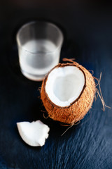 Fototapeta na wymiar Coconut with Coconut Water in a Glass. Coconut Milk. Coco nut cu