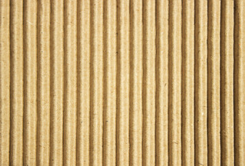 Cardboard paper background bright vertical corrugated strips