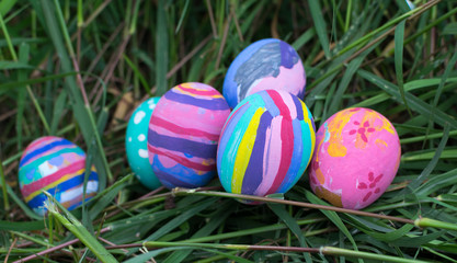 Easter eggs in Green Grass. Selective focus.