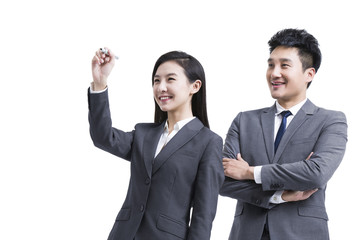 Business partners writing on visual screen