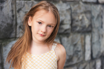 Close up portrait of a cute little girl of 7-8 years old