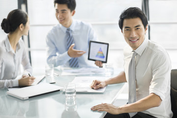 Portrait of young businessman in office