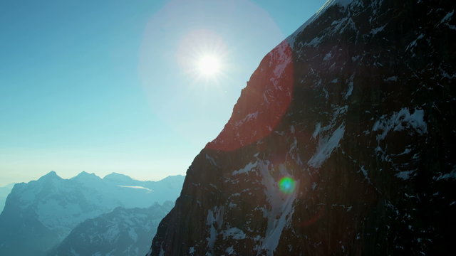 Aerial Eiger Switzerland valley mountain Alps sunlight travel