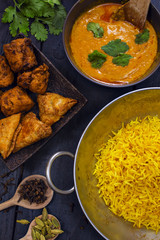 Indian pilau rice in balti dish served with chicken tikka masala