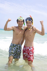 Obraz na płótnie Canvas Young men wearing snorkel gear