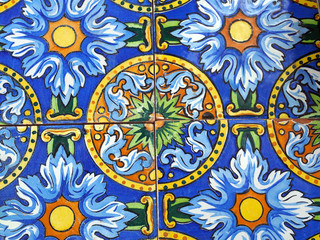 Detail of the traditional tiles from facade of old house in Valencia, Spain