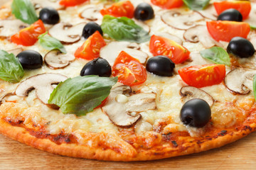 Pizza with mushrooms and vegetables