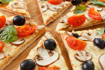 Sliced Pizza with mushrooms and vegetables